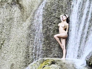 Wet Monika Fox In A Fishnet At Waterfall